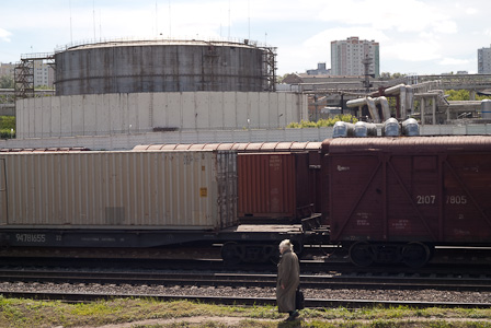 Lost among rails, trains, vans and industrial buldings...